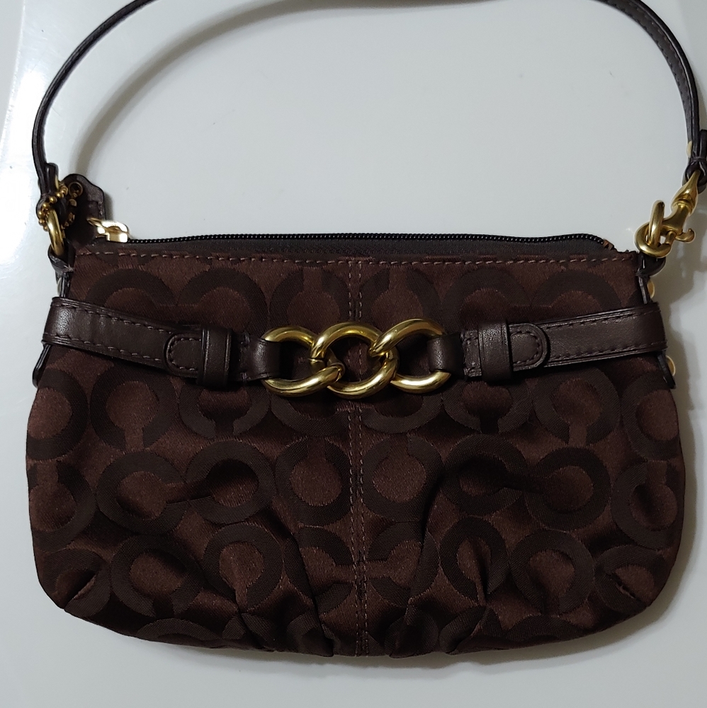 New! Coach large wristlet. Brown with gold hardware.